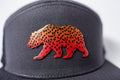 307 BEAR TROUT 7 PANEL - CHARCOAL/OLD GOLD